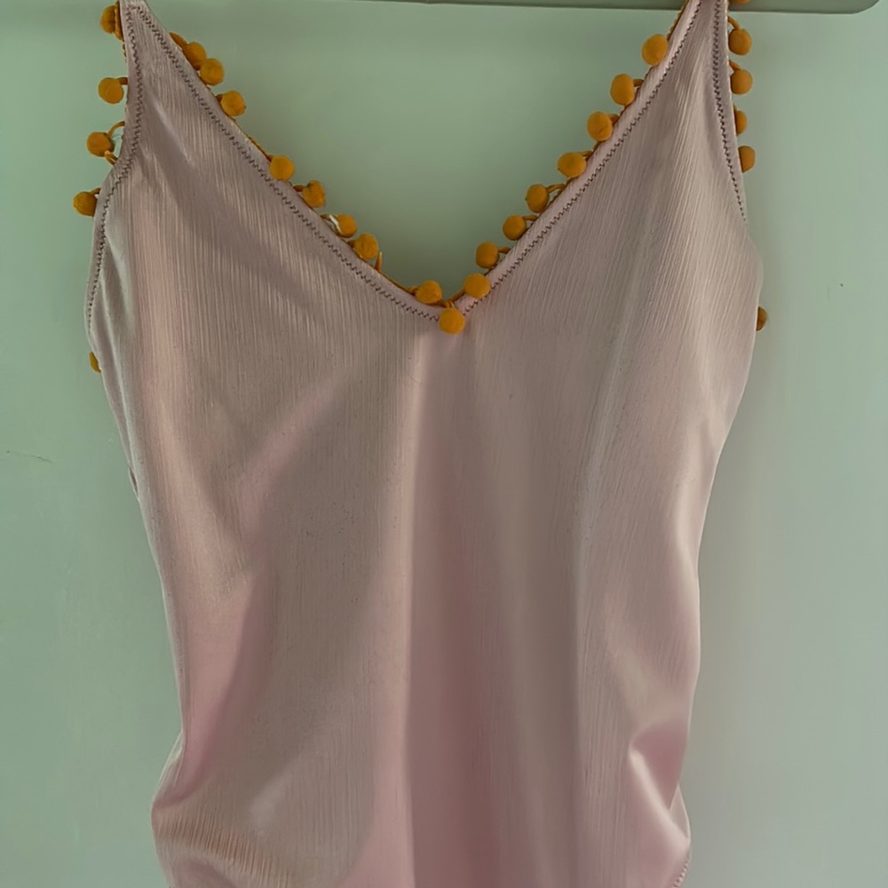Light Pink Bodysuit with Orange Pompom Trim